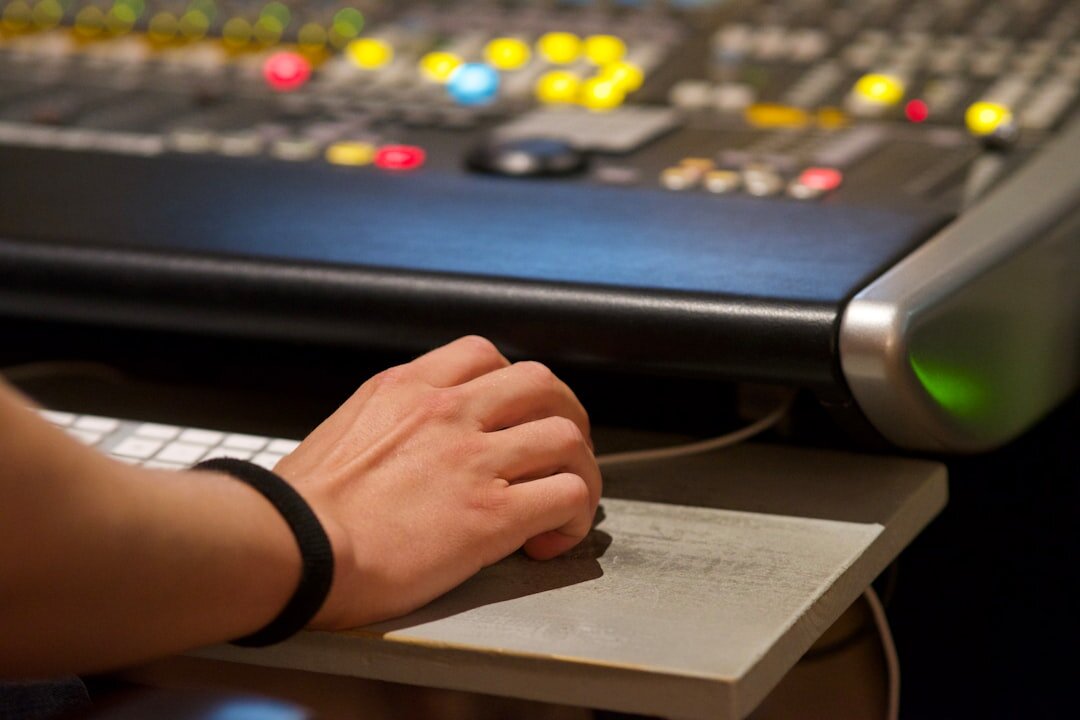 Sound engineer working at a studio mixing desk